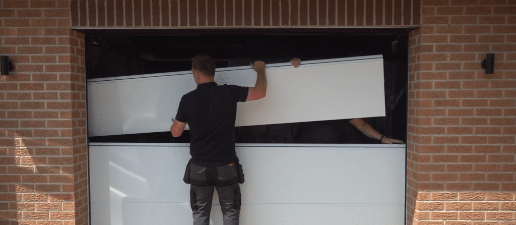 Garage Door Sales Person Installing